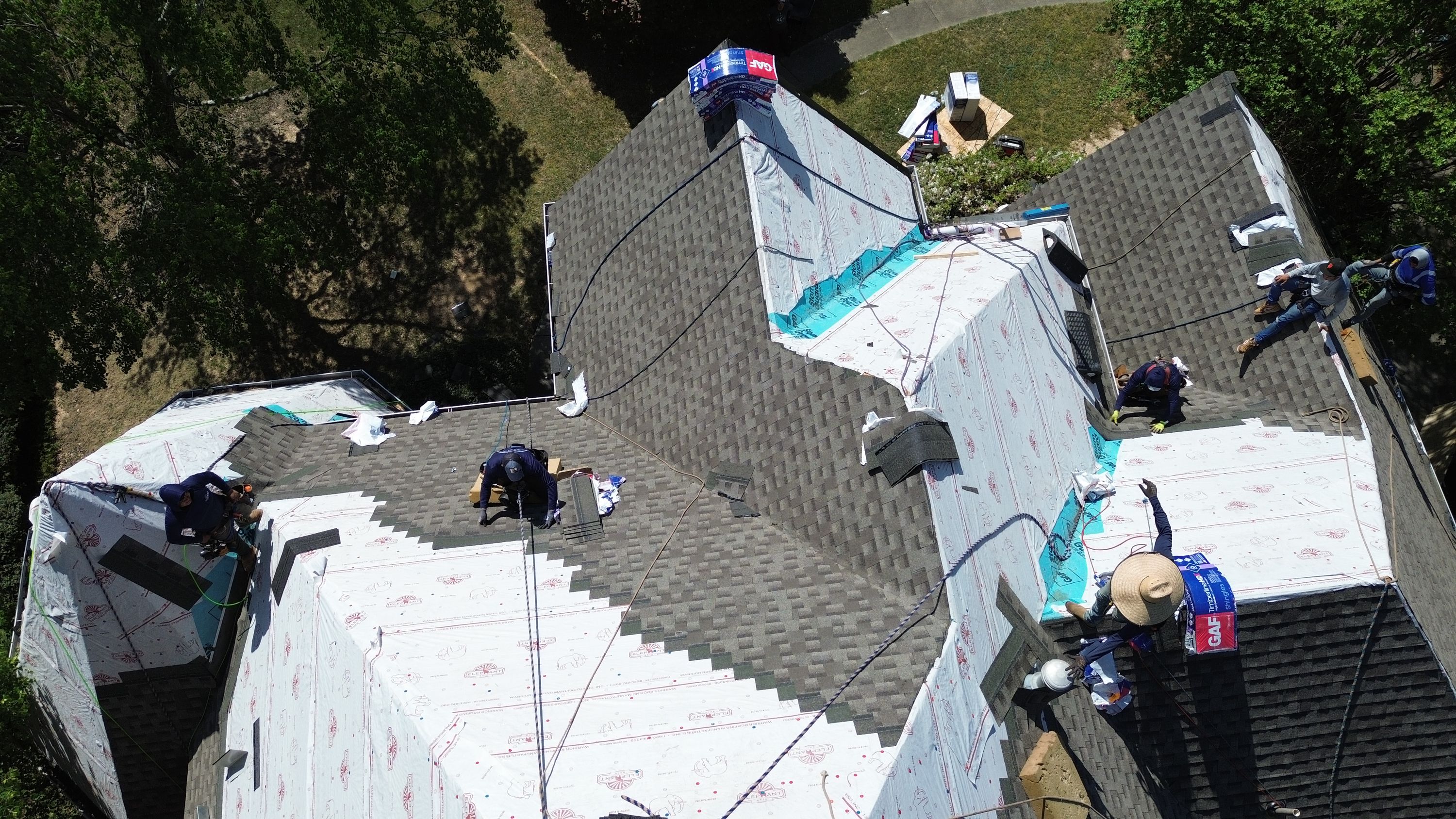 Patriot installs GAF shingles over synthetic underlayment during a Hoover roof replacement.