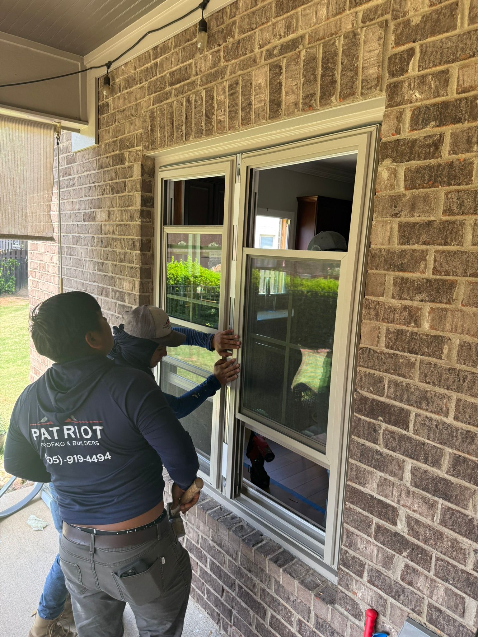 A new window installation in a brick home in the Bluff Park neighborhood of Hoover.