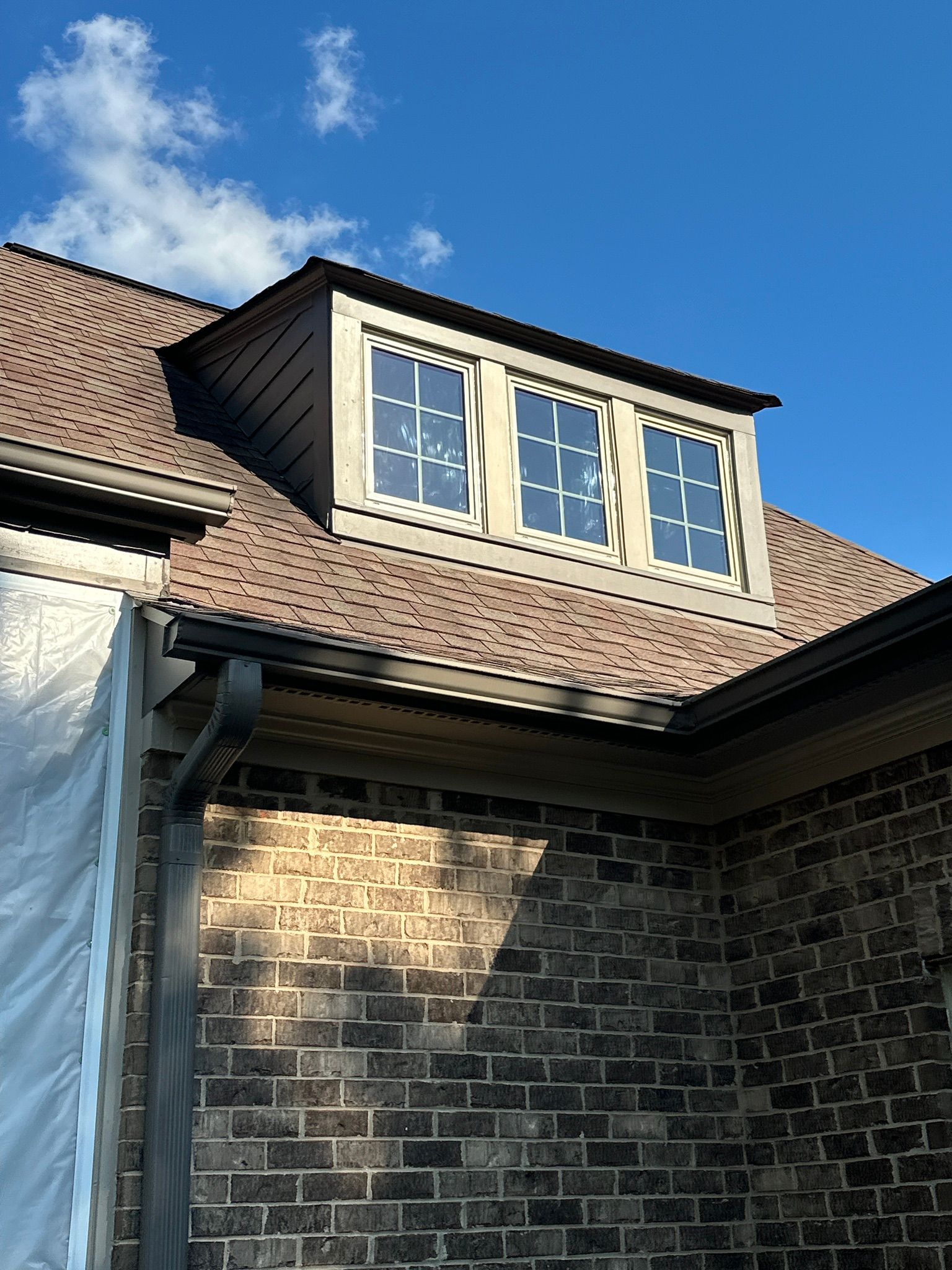 A dormer window replacement on a brick home in the Bluff Park neighborhood of Hoover.