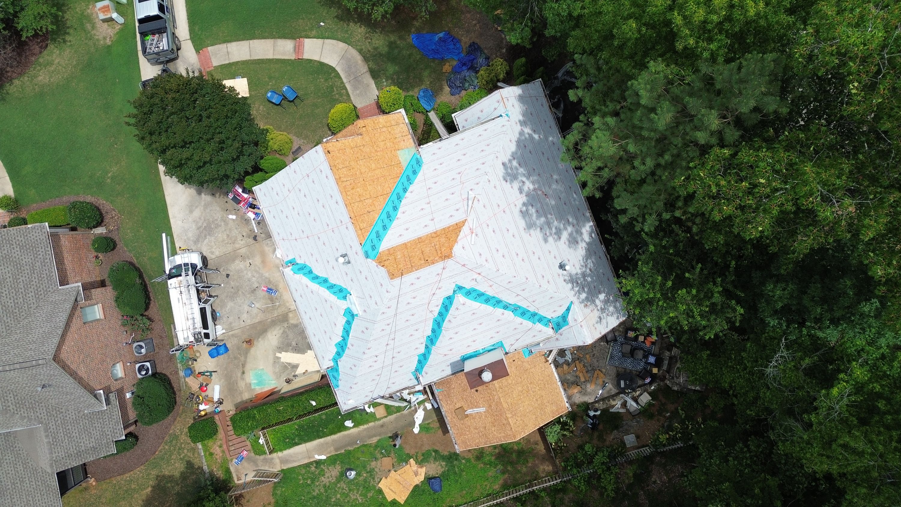 Aerial view of a roof replacement with synthetic underlayment on a home in Hoover.