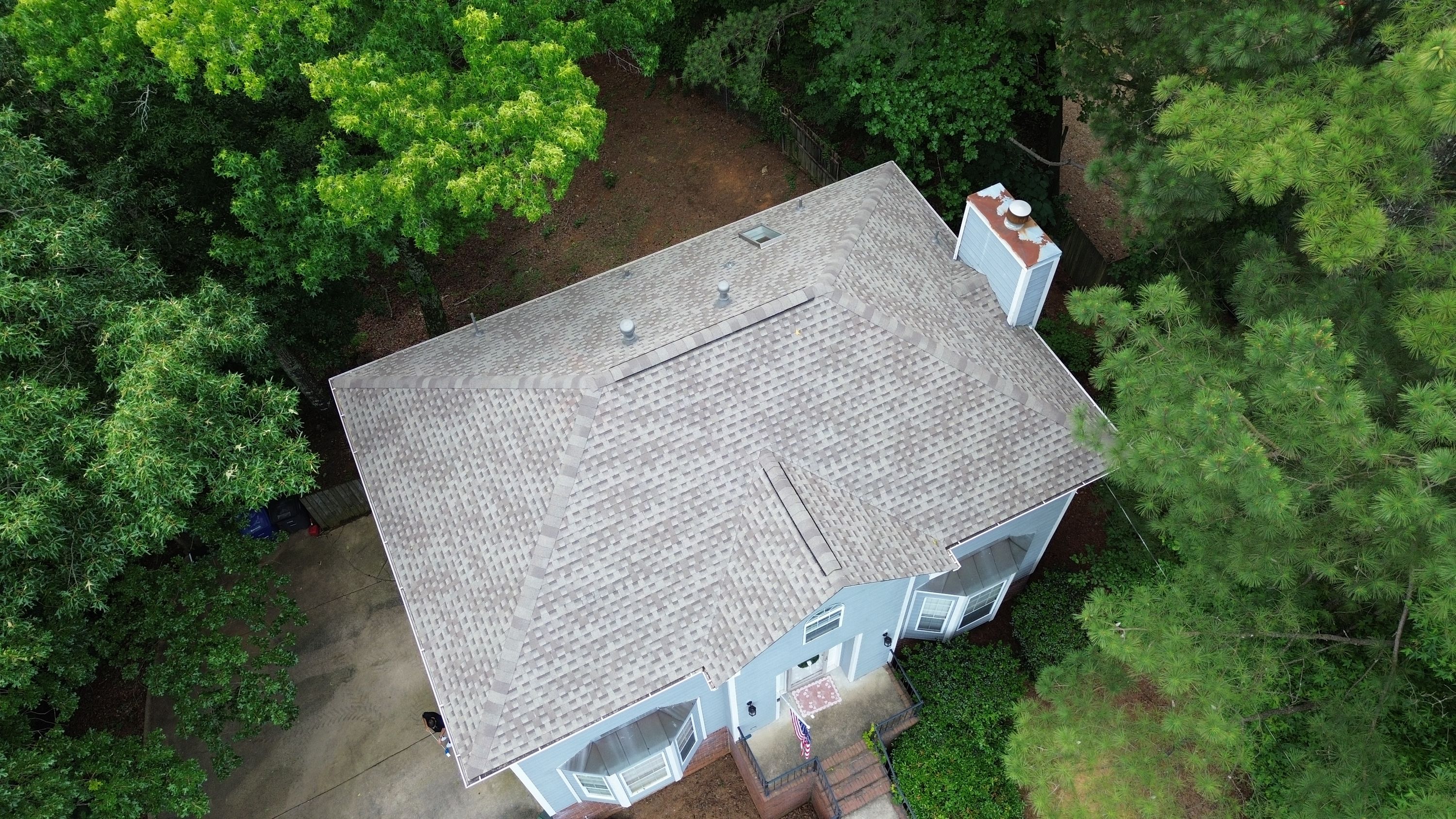 Overhead view of a completed roof replacement and skylight on a home in Fieldstone Park, Helena.