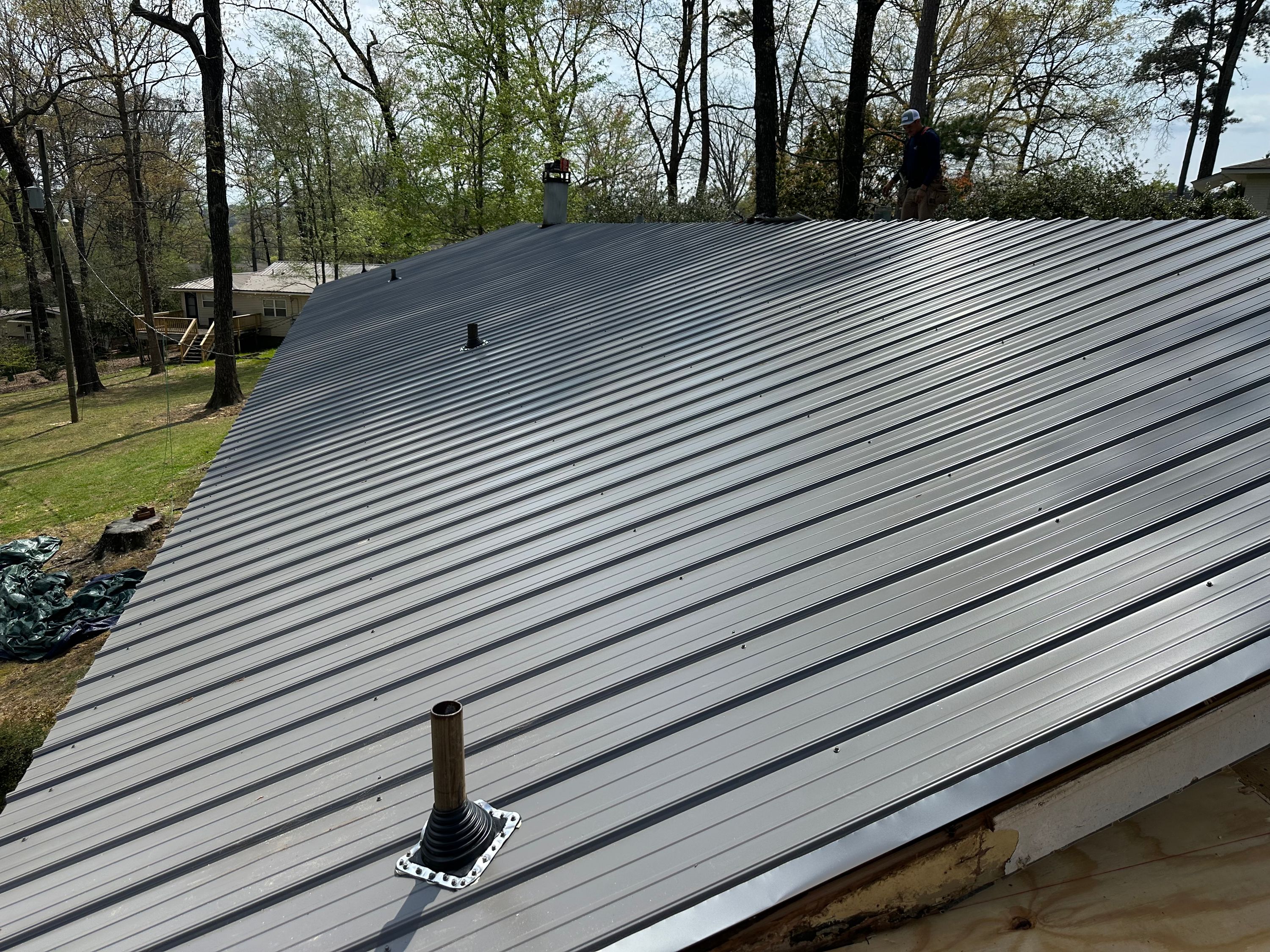 Newly installed gray metal roofing on a residential home in Cahaba Heights, Vestavia Hills.