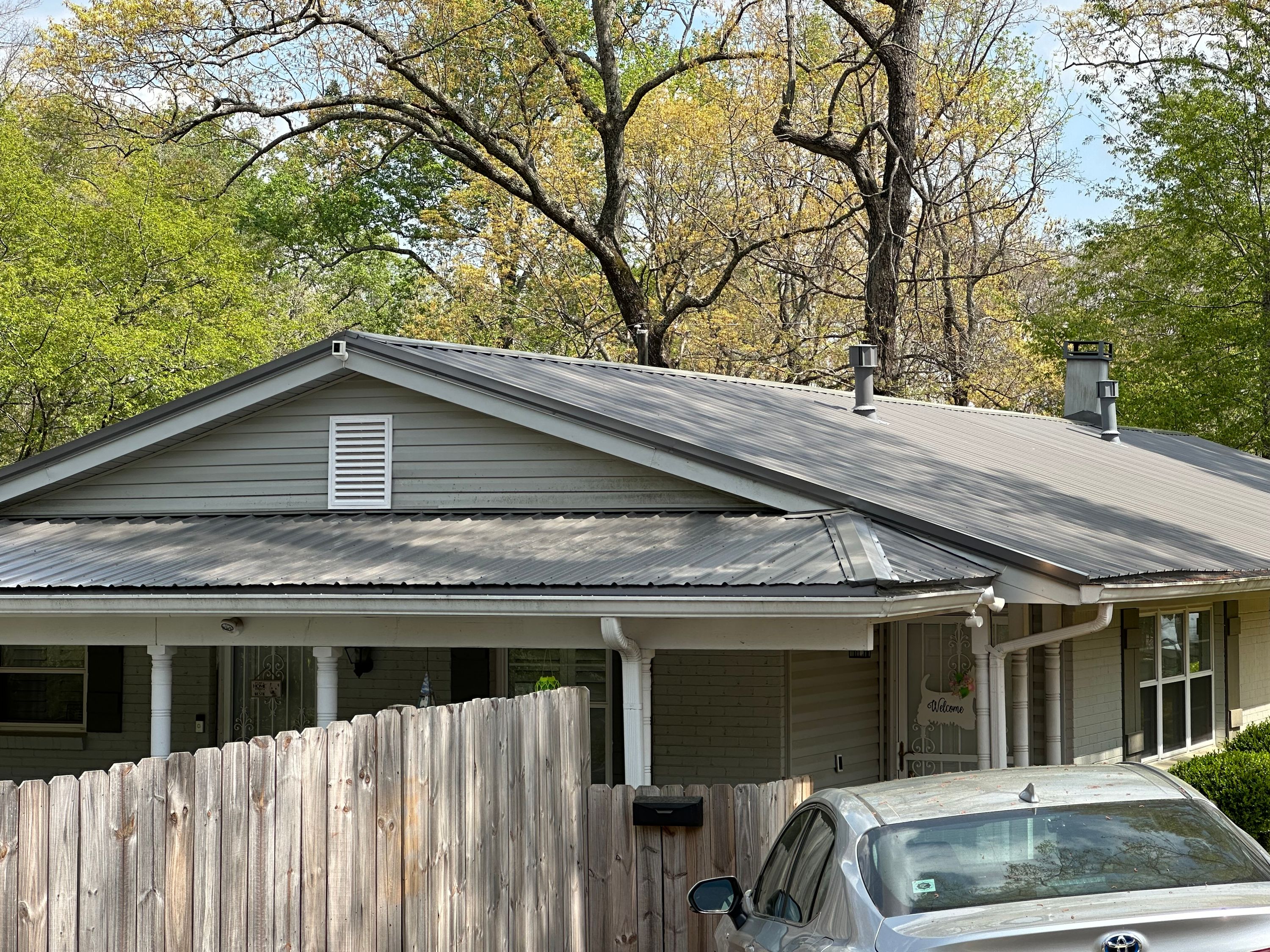 Standing seam metal roof replacement completed on a single-story home in Cahaba Heights.