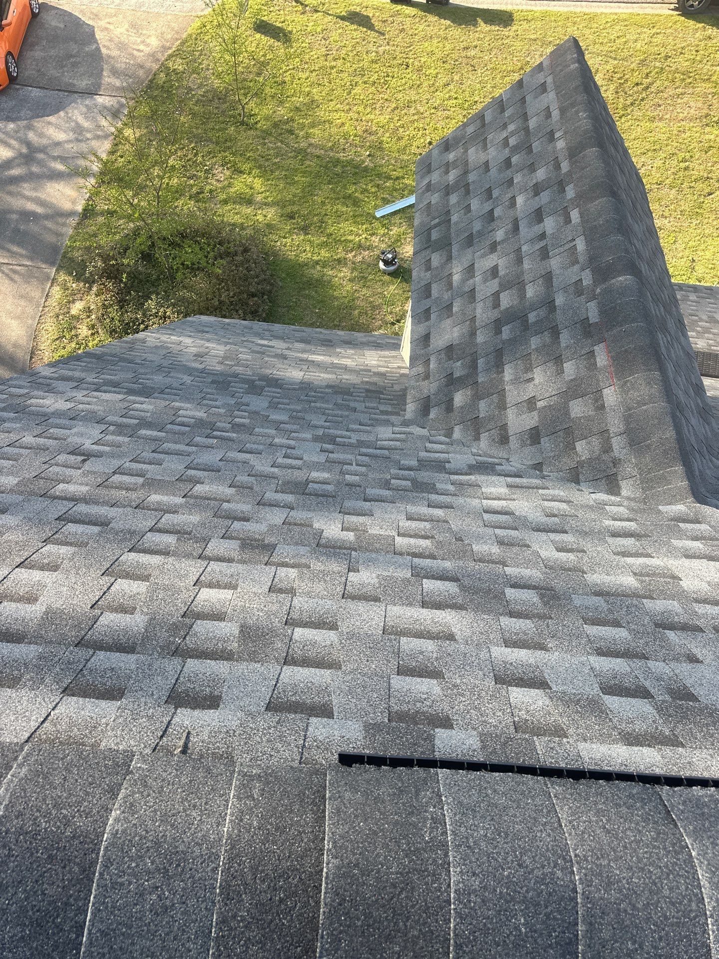 A newly installed gray architectural shingle roof on a home in the Bluff Park neighborhood of Hoover.