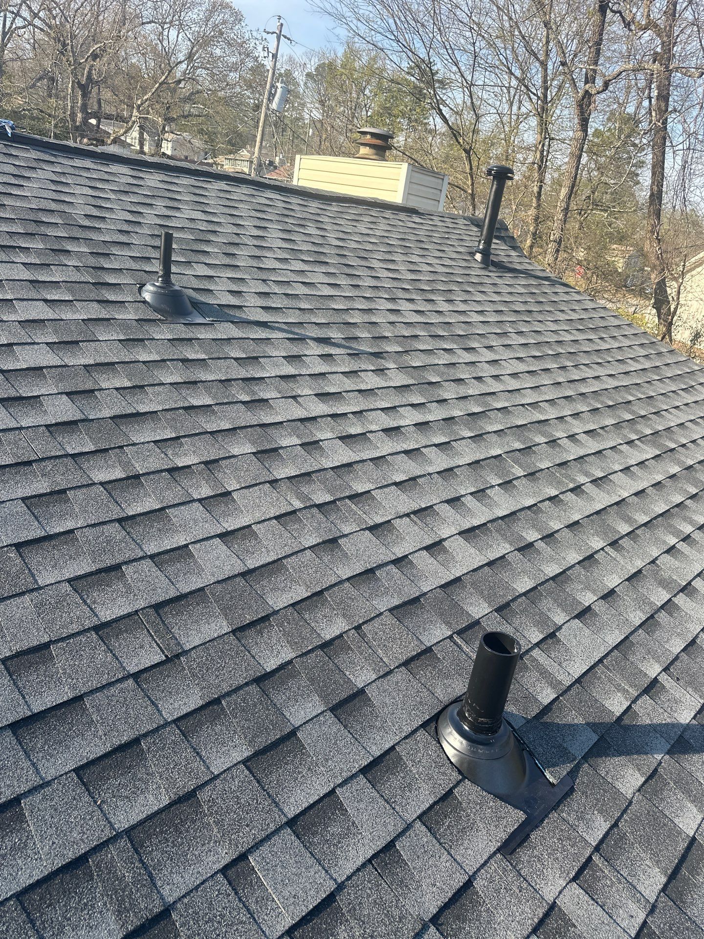 A newly installed gray asphalt shingle roof on a home in the Bluff Park neighborhood of Hoover.