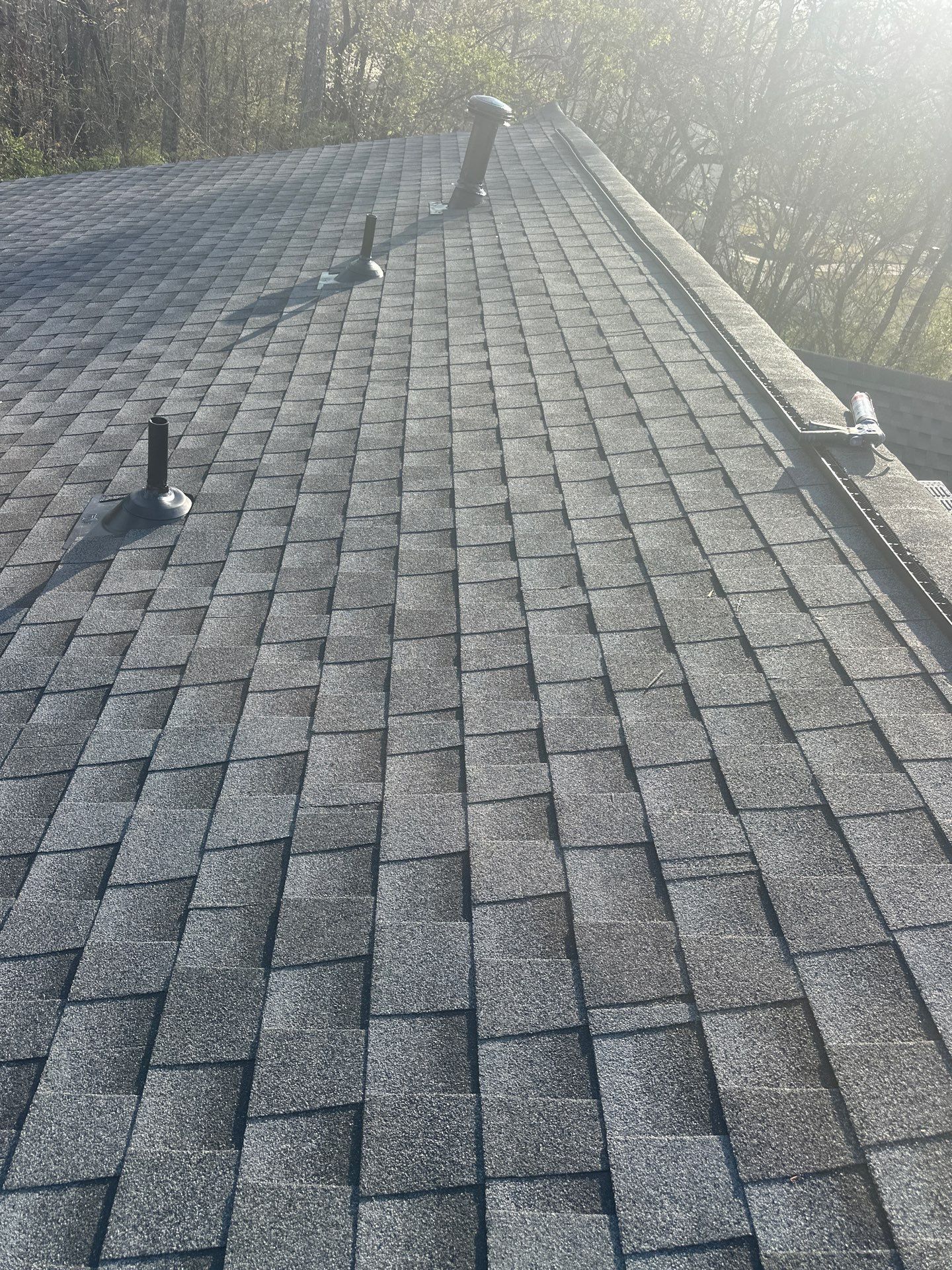 A newly installed gray asphalt shingle roof on a home in the Bluff Park neighborhood of Hoover.