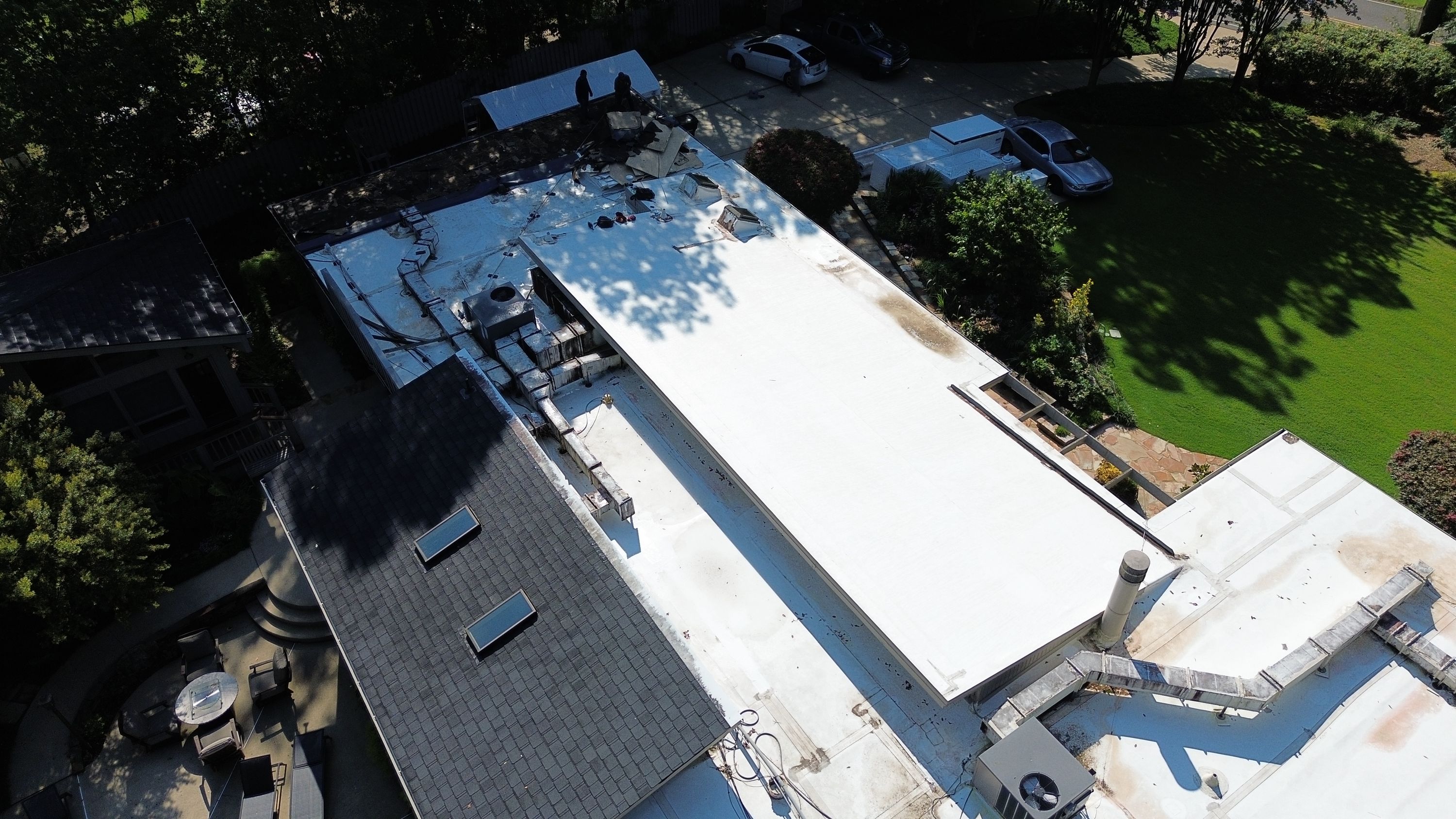 Debris sits on a flat roof during a roof replacement project along Montevallo Rd.