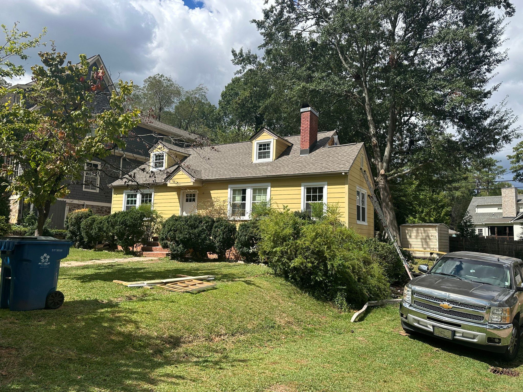 Side view of an exterior home renovation featuring new window installation in Homewood, Alabama.