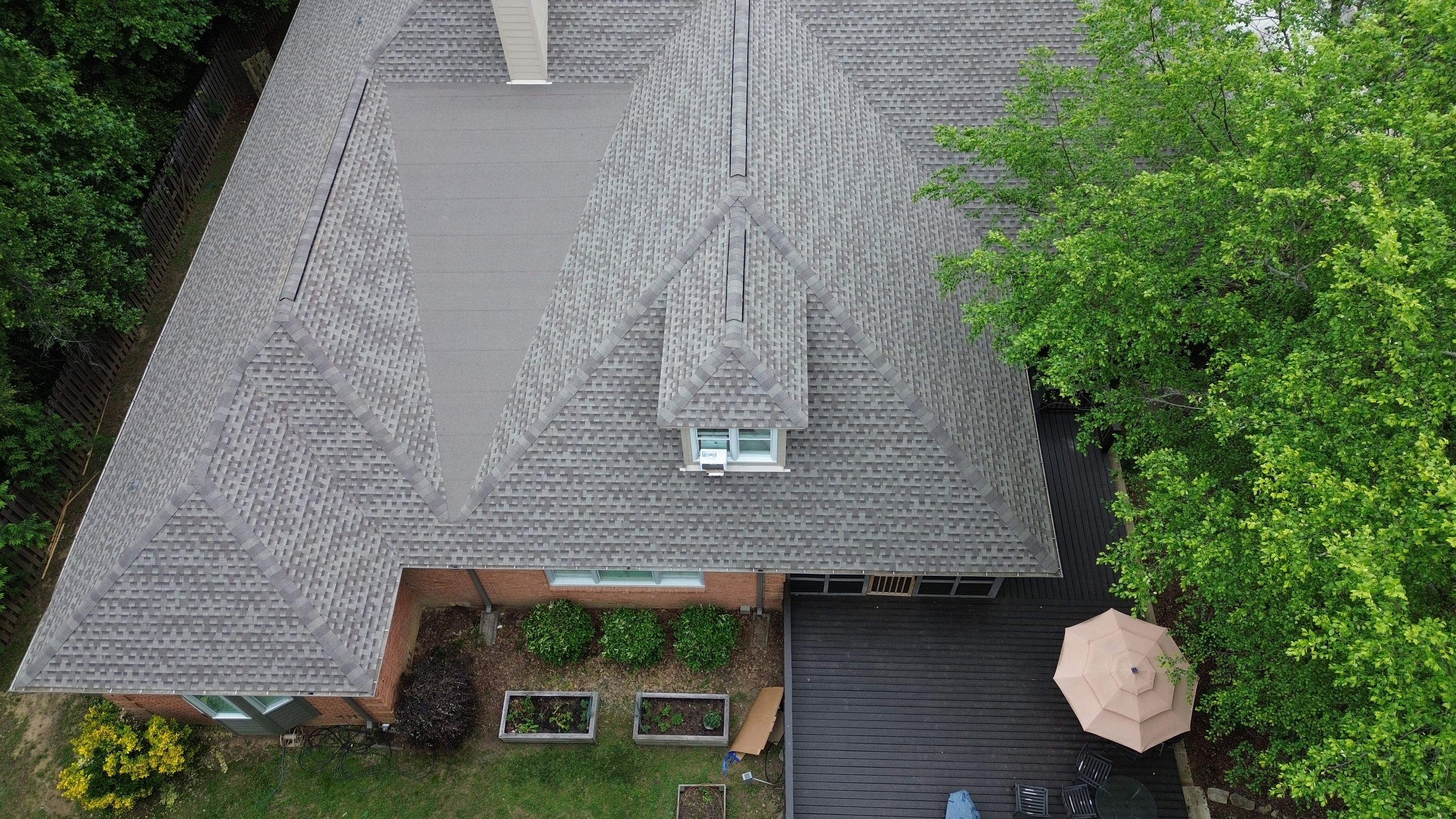 A newly installed gray asphalt shingle roof on a house in the Carisbrooke neighborhood of Hoover.