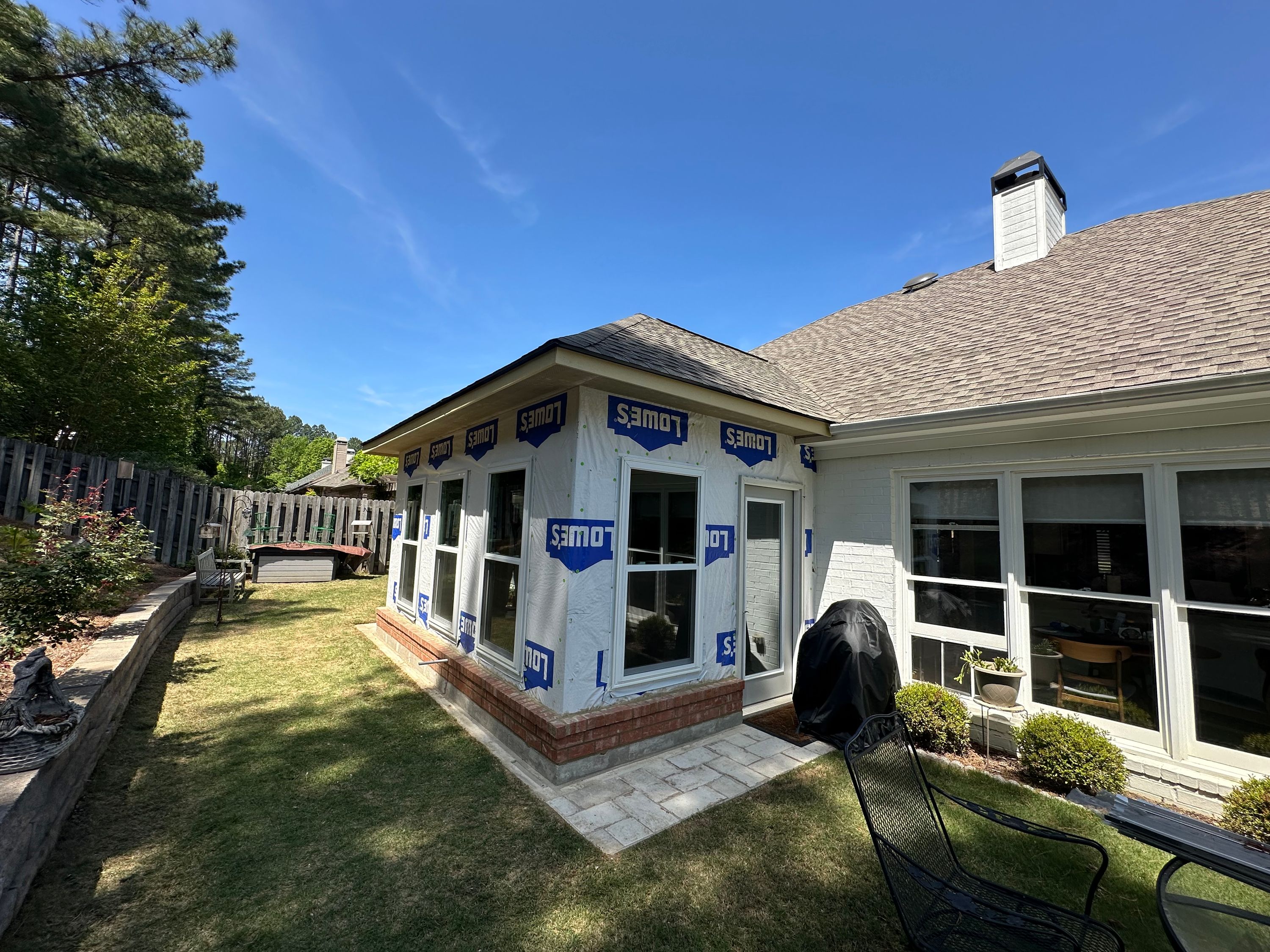 Roof replacement and house wrap installation on a residential home in the Greystone neighborhood of Hoover.