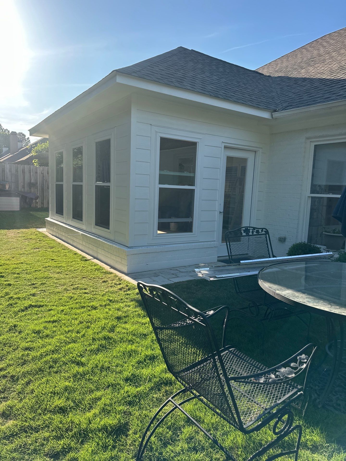 White lap siding installation on a home addition in the Greystone neighborhood of Hoover.