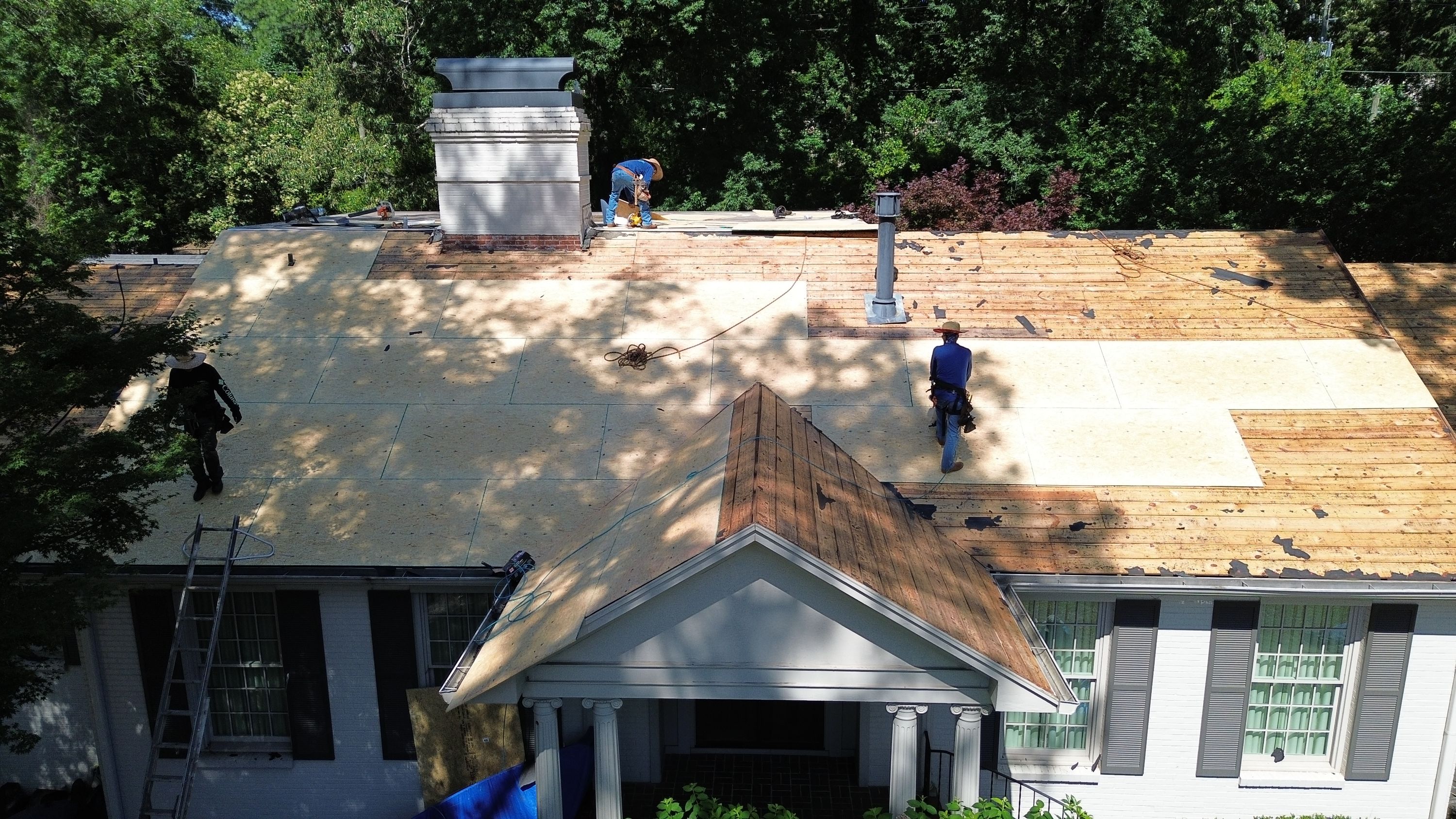 New wood sheathing installed during a home roof replacement project in Mountain Brook.