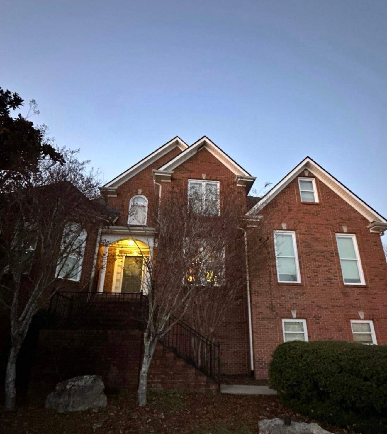 Finished front exterior of a Hoover home after a complete window replacement service.